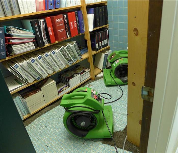 Drying equipment in small room.